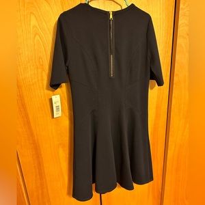 Navy blue dress with gold zipper detail, size 14